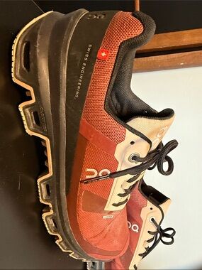 On Running Red and Tan Women's Trail Sneakers